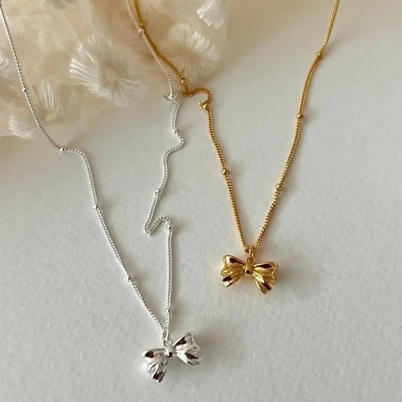 Sterling Silver Bow Pendant Necklace